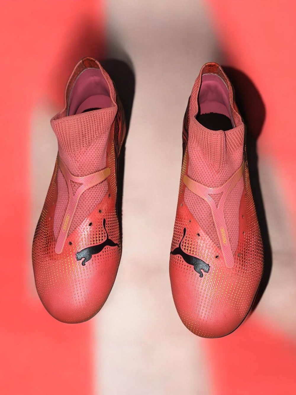 Puma Women's Coral-Pink Soccer Cleats with Black Logo